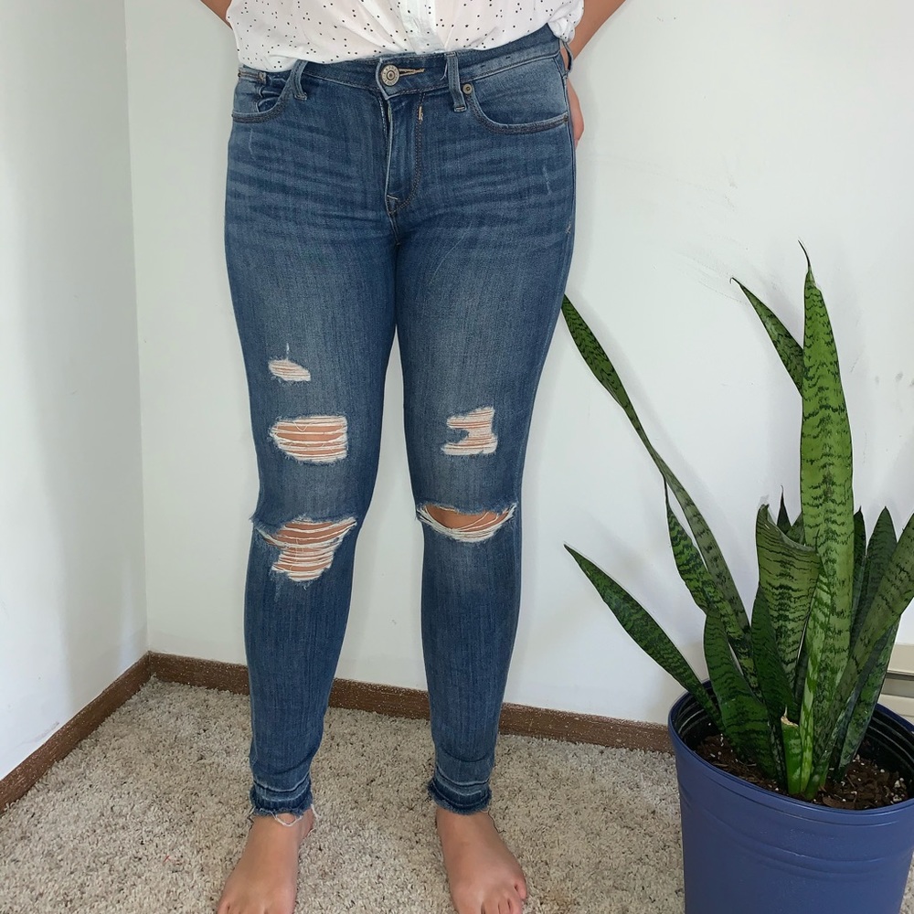 Express skinny jeans with ripped details